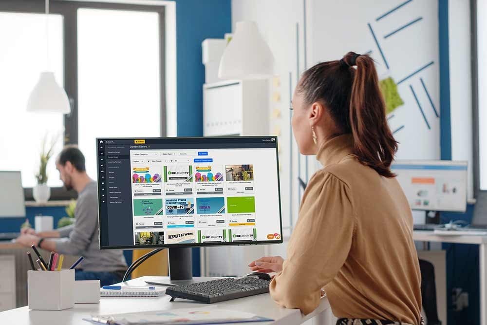 Woman browsing online course library