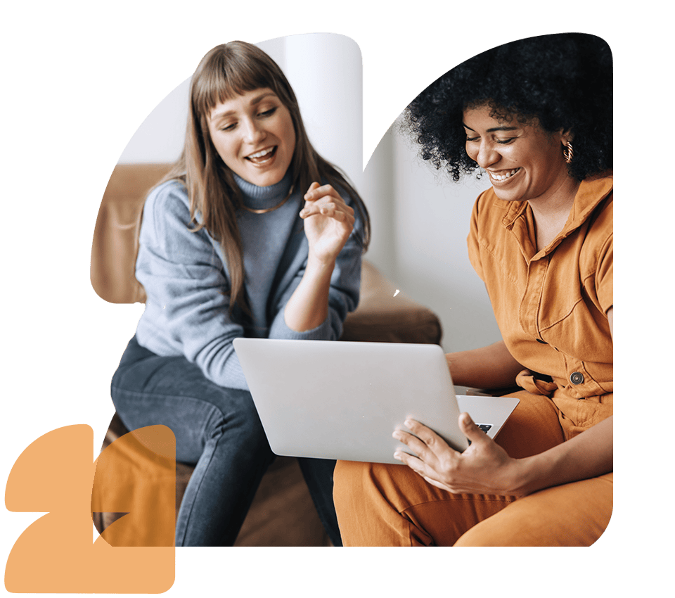 people viewing a laptop