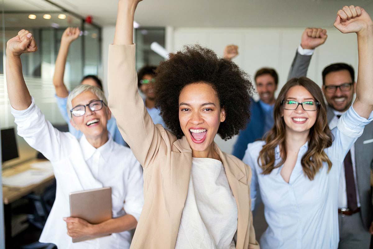 Employees cheering and celebrating